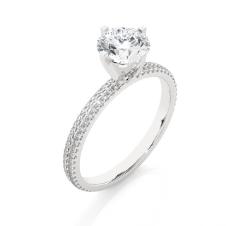 Angled view of 1.50 Ct Moissanite Engagement Ring With Accents In Silver, showcasing the band and setting.​