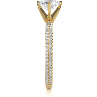 Side profile of 1.50 Ct Moissanite Engagement Ring With Accents In Yellow Gold, highlighting the prong setting.