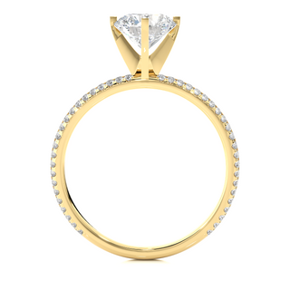 Side profile of 1.50 Ct Moissanite Engagement Ring With Accents In Yellow Gold, highlighting the prong setting.