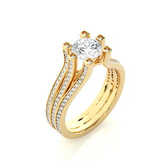 Angled view of 1.50 Ct Moissanite Three Row Split Shank Engagement Ring In Yellow Gold, showcasing the band and setting.​