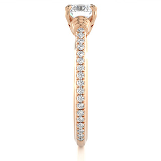 Side profile of Front view of 1.50 Ct Round Cut Moissanite French V-Split Engagement Ring In Rose Gold, highlighting the brilliant center moissanite stone., highlighting the prong setting.