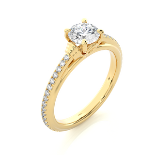 Angled view of 1.50 Ct Round Cut Moissanite French V-Split Engagement Ring In Yellow Gold, showcasing the band and setting.​