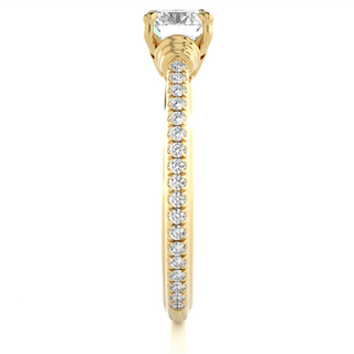 Side profile of Front view of 1.50 Ct Round Cut Moissanite French V-Split Engagement Ring In Yellow Gold, highlighting the brilliant center moissanite stone., highlighting the prong setting.