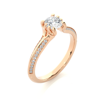 Angled view of 1.50 Ct Round Cut Moissanite Two Row Accent Engagement Ring In Rose Gold, showcasing the band and setting.​