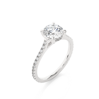 Angled view of 1.50 Ct Round Moissanite Hidden Halo Engagement Ring In Silver, showcasing the band and setting.​
