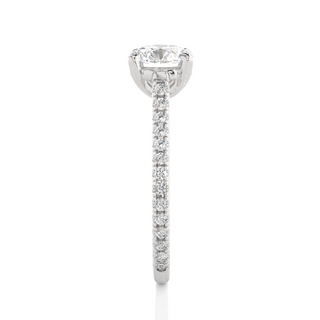 Side profile of 1.50 Ct Round Moissanite Hidden Halo Engagement Ring In White Gold, highlighting the brilliant center moissanite stone., highlighting the prong setting.