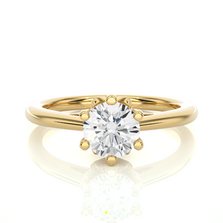 Front view of 1.50 Ct Round Moissanite Solitaire Engagement Ring In Yellow Gold, highlighting the brilliant center moissanite stone.
