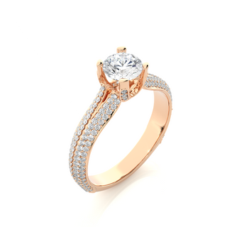 Angled view of 1.50 Ct Round Moissanite Split Shank Engagement Ring In Rose Gold, showcasing the band and setting.​