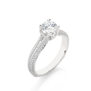 Angled view of 1.50 Ct Round Moissanite Split Shank Engagement Ring In White Gold, showcasing the band and setting.​