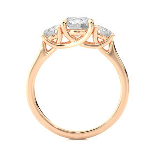 Side profile of 1.50 Ct Round Moissanite Three Stone Engagement Ring In Rose Gold, highlighting the brilliant center moissanite stone., highlighting the prong setting.