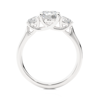 Side profile of 1.50 Ct Round Moissanite Three Stone Engagement Ring In Silver, highlighting the brilliant center moissanite stone., highlighting the prong setting.