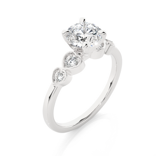 Angled view of 1.50 Ct Round cut Moissanite Five Stone Engagement Ring In Silver, showcasing the band and setting.​