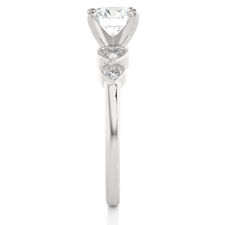 Side profile of Front view of 1.50 Ct Round cut Moissanite Five Stone Engagement Ring In White Gold, highlighting the brilliant center moissanite stone., highlighting the prong setting.