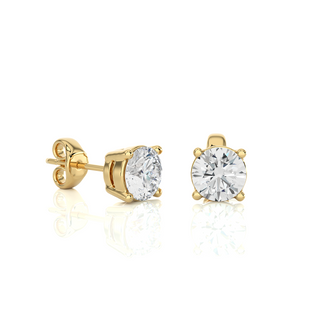 Side view of 1 Carat Four Prong Round Cut Moissanite Stud Earrings in Yellow Gold, highlighting prong height and earring profile.