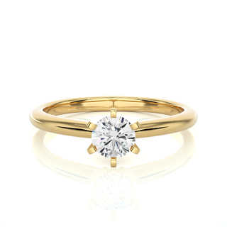 Front view of 1 Carat Round Cut Solitaire Moissanite Ring in Yellow Gold, highlighting the brilliant center moissanite stone.