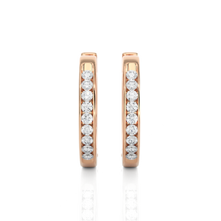 Front View of 1 Carat Round Moissanite Channel Set Hoop Earrings In Rose Gold, shown from the front for full sparkle.