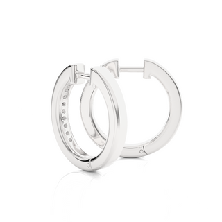 Angled view of 1 Carat Round Moissanite Channel Set Hoop Earrings In Silver, showing brilliance and curved shape.