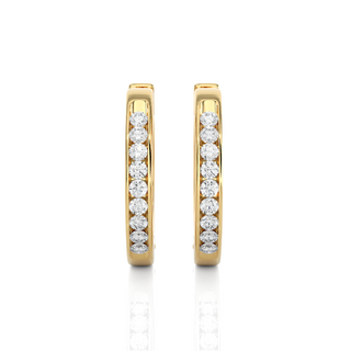 Front View of 1 Carat Round Moissanite Channel Set Hoop Earrings In Yellow Gold, shown from the front for full sparkle.