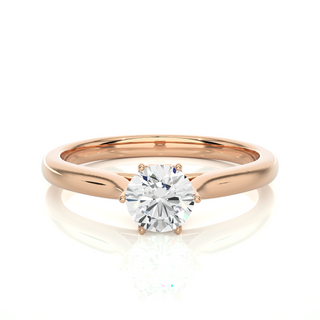 Front view of 1 Carat Round Moissanite Solitaire Engagement Ring In Rose Gold, highlighting the brilliant center moissanite stone.