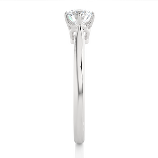 Side profile of 1 Carat Round Moissanite Solitaire Engagement Ring In Silver, highlighting the prong setting.
