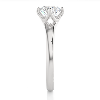 Side profile of 1 Carat Round Moissanite Split Shank Solitaire Engagement Ring In Silver, highlighting the prong setting.