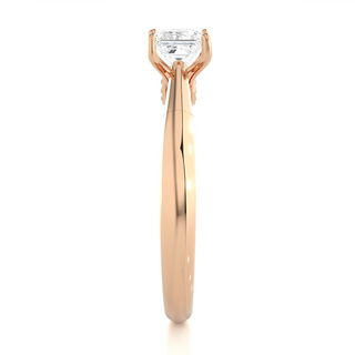 Side profile of 1 Ct Princess Moissanite Solitaire Engagement Ring In Rose Gold, highlighting the prong setting.