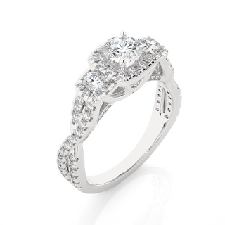 Angled view of 2.50 Ct Round Moissanite Three Stone Halo Engagement Ring In Silver, showcasing the band and setting.​