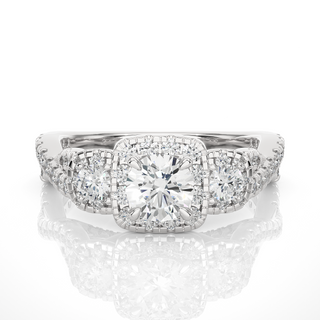 Front view of 2.50 Ct Round Moissanite Three Stone Halo Engagement Ring In Silver, highlighting the brilliant center Moissanite stone.