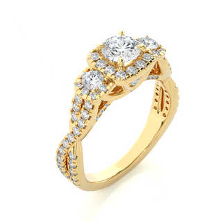 Angled view of 2.50 Ct Round Moissanite Three Stone Halo Engagement Ring In Yellow Gold, showcasing the band and setting.​