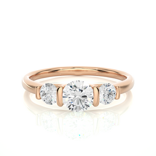 Front view of 2 Carat Round Cut Moissanite Three Stone Engagement Ring In Rose Gold, highlighting the brilliant center Moissanite stone.