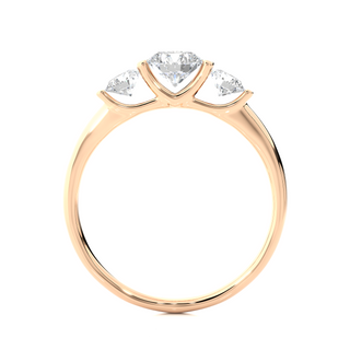 Side profile of 2 Carat Round Cut Moissanite Three Stone Engagement Ring In Rose Gold, highlighting the brilliant center moissanite stone., highlighting the prong setting.