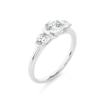 Angled view of 2 Carat Round Cut Moissanite Three Stone Engagement Ring In Silver, showcasing the band and setting.​