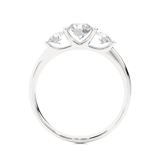 Side profile of 2 Carat Round Cut Moissanite Three Stone Engagement Ring In Silver, highlighting the brilliant center moissanite stone., highlighting the prong setting.
