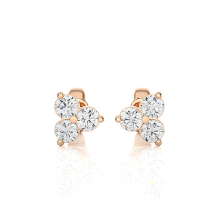 Front view of 2 Carat Round Cut Moissanite Three Stone Stud Earrings In Rose Gold, showing full sparkle.