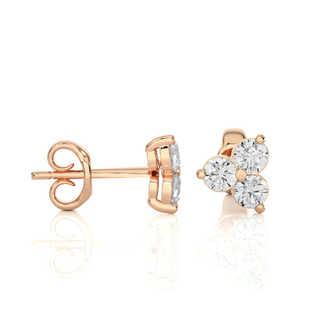 Side view of 2 Carat Round Cut Moissanite Three Stone Stud Earrings In Rose Gold, showing depth and setting details.
