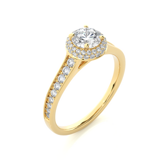 Angled view of 2 Ct Round Cut Moissanite Halo Engagement Ring In Yellow Gold, showcasing the band and setting.​