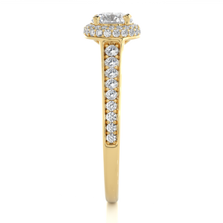 Side profile of 2 Ct Round Cut Moissanite Halo Engagement Ring In Yellow Gold, highlighting the brilliant center moissanite stone., highlighting the prong setting.