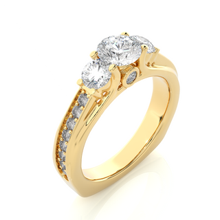 Angled view of 2 Ct Round Moissanite Three Stone Engagement Ring In Yellow Gold, showcasing the band and setting.​