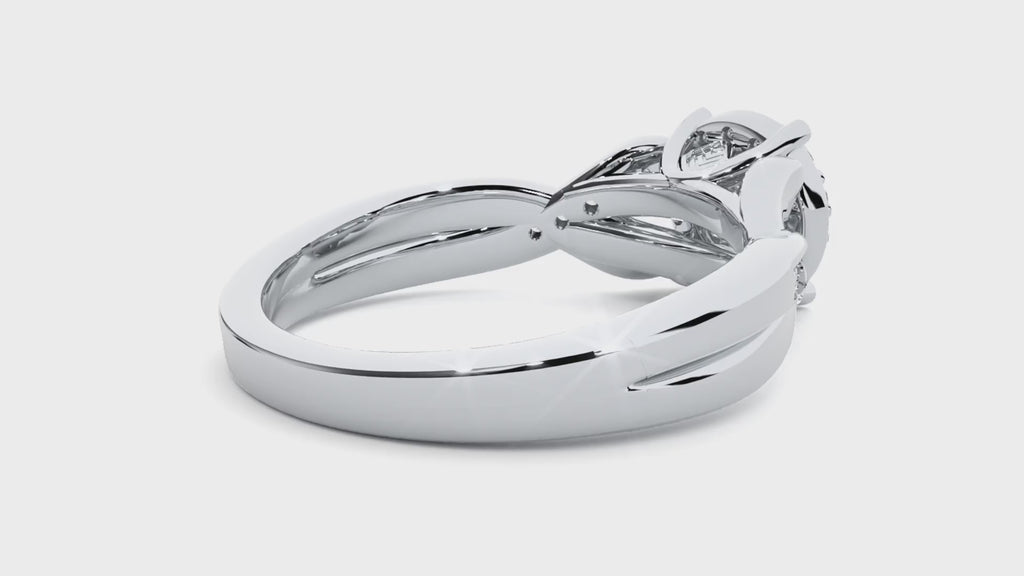 White gold Round Moissanite Halo Twisted Ring video showcasing sparkle and elegant design.
