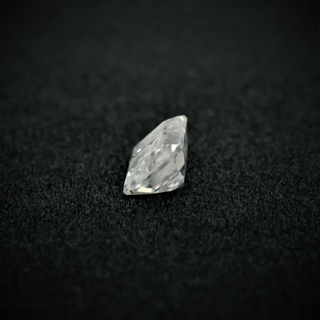 Side view of the emerald cut moissanite—sharp lines, elegant shape, and a brilliant shine from every angle.