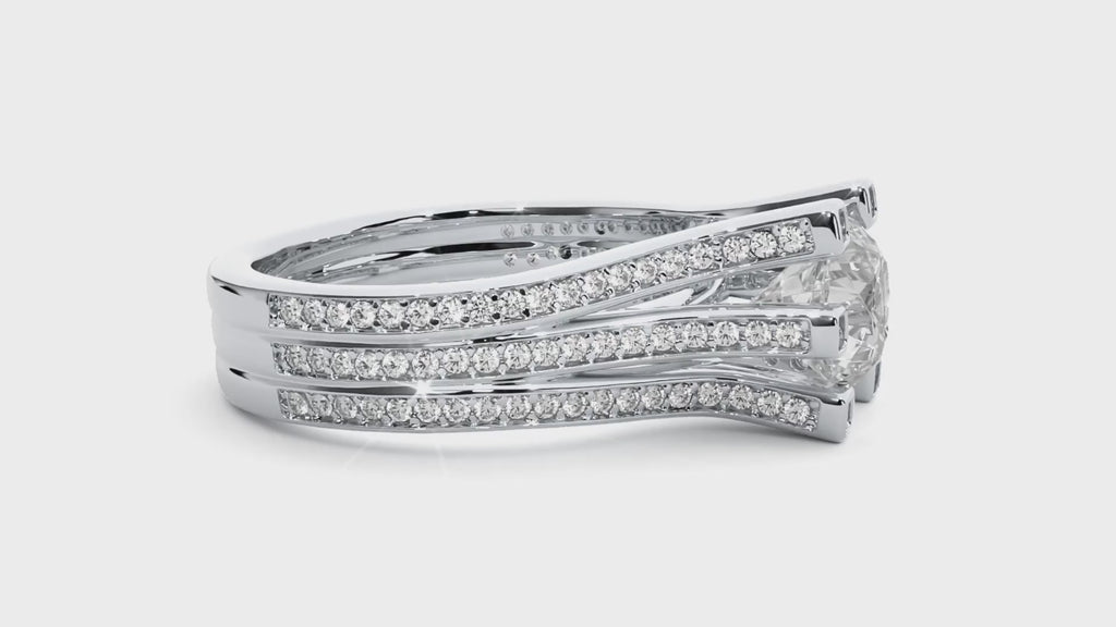 Video of round moissanite engagement ring with three-row split shank band, rotating to highlight its sparkle and elegant design.