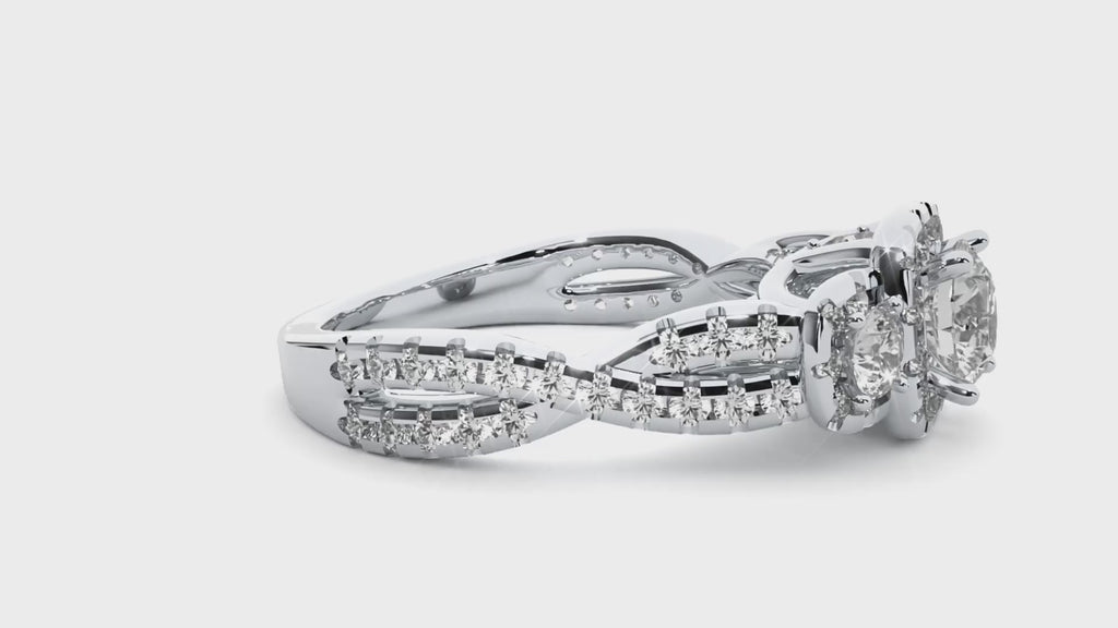 White gold halo twisted three-stone moissanite ring video showcasing its brilliance and elegant design.