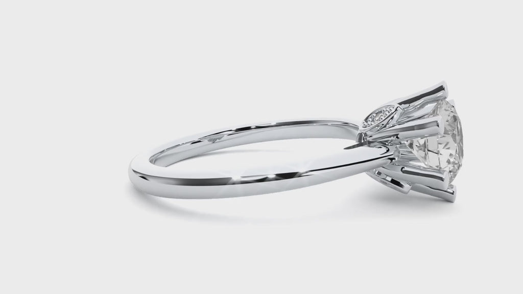 1.50 ct round Moissanite solitaire ring in white gold with six-prong setting, shown in a rotating 360° video.