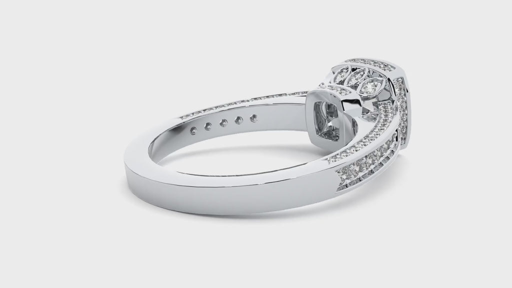 Video of a white gold four-prong halo moissanite engagement ring with pavé band rotating under studio lighting.
